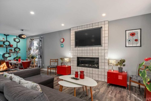 224 Cedarbrae Crescent Sw, Calgary, AB - Indoor Photo Showing Living Room With Fireplace