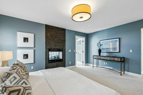 2035 29 Avenue Sw, Calgary, AB - Indoor Photo Showing Bedroom With Fireplace