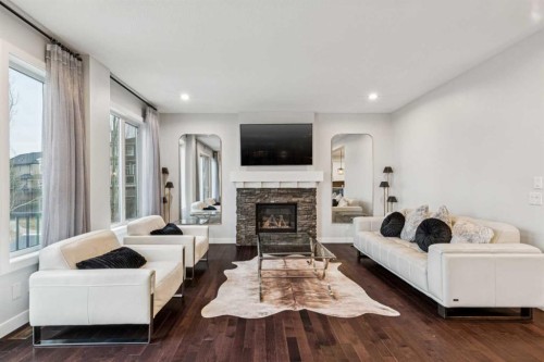 290 Mahogany Place Se, Calgary, AB - Indoor Photo Showing Living Room With Fireplace