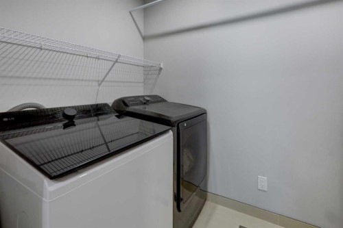 42 Evansbrooke Way Nw, Calgary, AB - Indoor Photo Showing Laundry Room