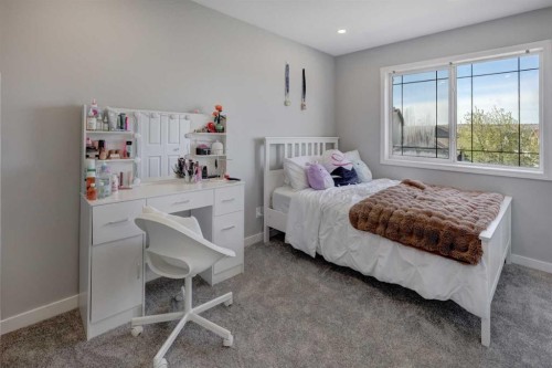 42 Evansbrooke Way Nw, Calgary, AB - Indoor Photo Showing Bedroom
