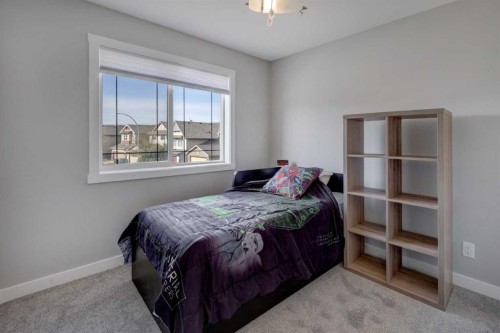 42 Evansbrooke Way Nw, Calgary, AB - Indoor Photo Showing Bedroom
