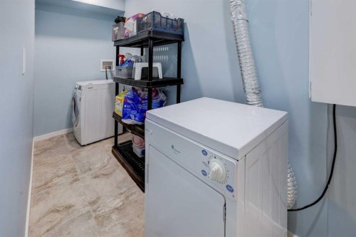 42 Evansbrooke Way Nw, Calgary, AB - Indoor Photo Showing Laundry Room