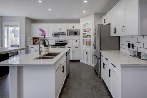 42 Evansbrooke Way Nw, Calgary, AB - Indoor Photo Showing Kitchen With Double Sink With Upgraded Kitchen