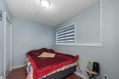 1209 52A Street Se, Calgary, AB - Indoor Photo Showing Bedroom