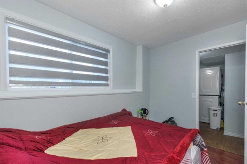 1209 52A Street Se, Calgary, AB - Indoor Photo Showing Bedroom