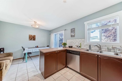 57 Martinvalley Way Ne, Calgary, AB - Indoor Photo Showing Kitchen With Double Sink