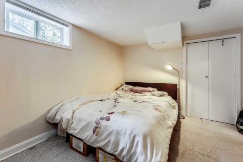 409 12 Avenue Nw, Calgary, AB - Indoor Photo Showing Bedroom