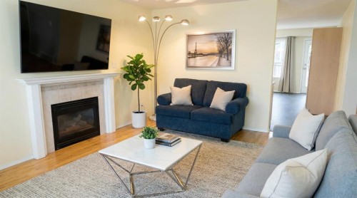 189 Sitar Crescent, Hinton, AB - Indoor Photo Showing Living Room With Fireplace
