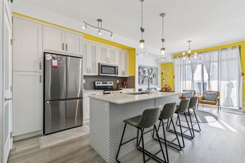 4404-200 Seton Circle Se, Calgary, AB - Indoor Photo Showing Kitchen With Stainless Steel Kitchen With Upgraded Kitchen