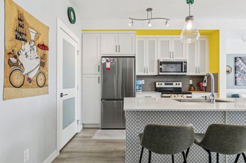 4404-200 Seton Circle Se, Calgary, AB - Indoor Photo Showing Kitchen With Stainless Steel Kitchen With Double Sink