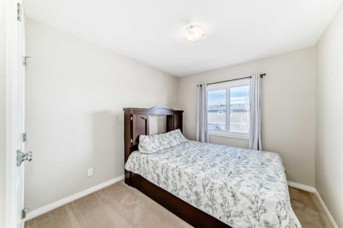 145 Red Sky Way Ne, Calgary, AB - Indoor Photo Showing Bedroom