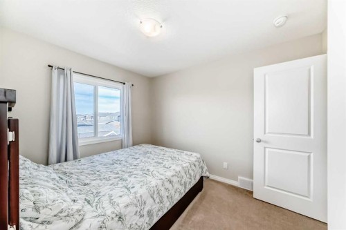 145 Red Sky Way Ne, Calgary, AB - Indoor Photo Showing Bedroom