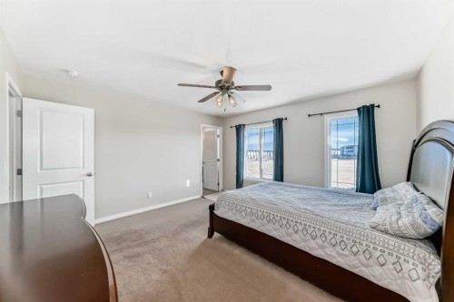 145 Red Sky Way Ne, Calgary, AB - Indoor Photo Showing Bedroom