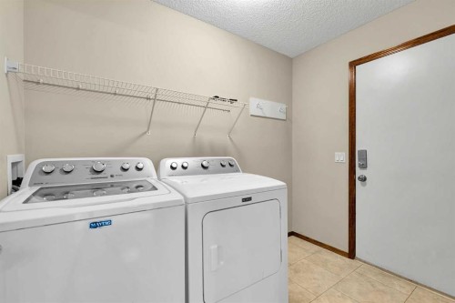 271 Edgebrook Park Nw, Calgary, AB - Indoor Photo Showing Laundry Room