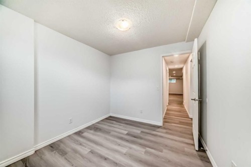 81 Bearberry Close Nw, Calgary, AB - Indoor Photo Showing Other Room