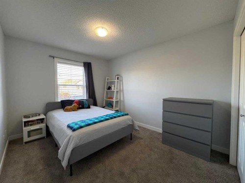 1091 Brightoncrest Green Se, Calgary, AB - Indoor Photo Showing Bedroom