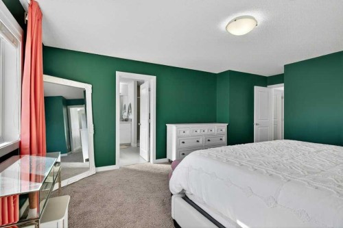 1091 Brightoncrest Green Se, Calgary, AB - Indoor Photo Showing Bedroom