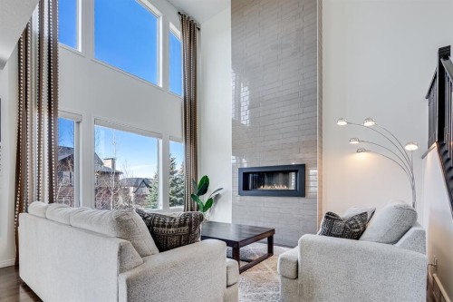 117 Mahogany Place Se, Calgary, AB - Indoor Photo Showing Living Room With Fireplace