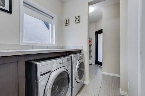 117 Mahogany Place Se, Calgary, AB - Indoor Photo Showing Laundry Room