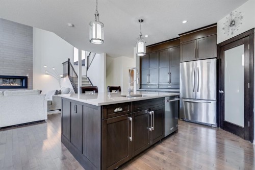 117 Mahogany Place Se, Calgary, AB - Indoor Photo Showing Kitchen With Upgraded Kitchen