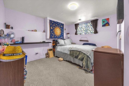 301 Mcleod Crescent, Diamond Valley, AB - Indoor Photo Showing Bedroom