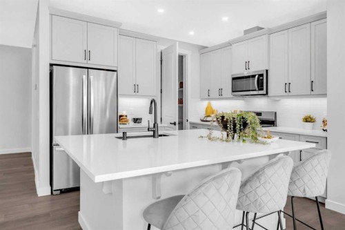 55 Amblehurst Link Nw, Calgary, AB - Indoor Photo Showing Kitchen With Upgraded Kitchen