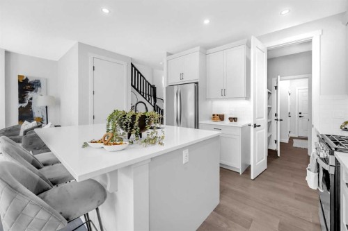 55 Amblehurst Link Nw, Calgary, AB - Indoor Photo Showing Kitchen With Upgraded Kitchen