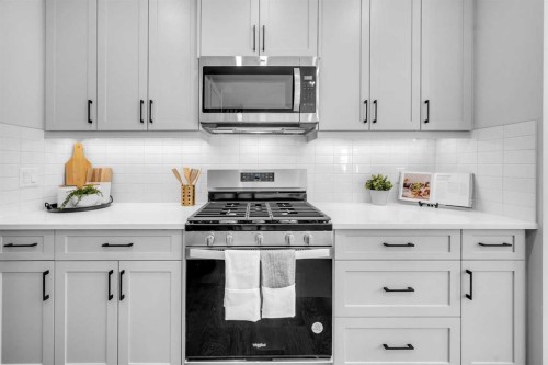 55 Amblehurst Link Nw, Calgary, AB - Indoor Photo Showing Kitchen With Upgraded Kitchen