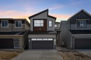 55 Amblehurst Link Nw, Calgary, AB  - Outdoor With Facade 