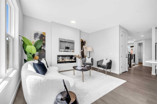 55 Amblehurst Link Nw, Calgary, AB - Indoor Photo Showing Living Room With Fireplace
