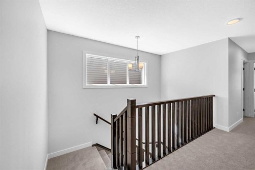 55 Amblehurst Link Nw, Calgary, AB - Indoor Photo Showing Other Room