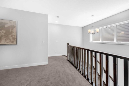 55 Amblehurst Link Nw, Calgary, AB - Indoor Photo Showing Other Room