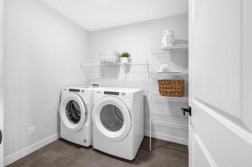 55 Amblehurst Link Nw, Calgary, AB - Indoor Photo Showing Laundry Room