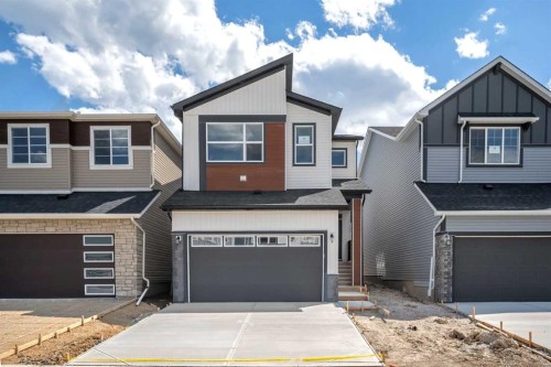 55 Amblehurst Link Nw, Calgary, AB - Outdoor With Facade