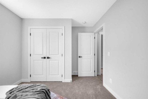 55 Amblehurst Link Nw, Calgary, AB - Indoor Photo Showing Bedroom