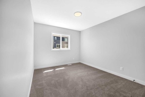 55 Amblehurst Link Nw, Calgary, AB - Indoor Photo Showing Other Room