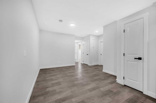 55 Amblehurst Link Nw, Calgary, AB - Indoor Photo Showing Other Room