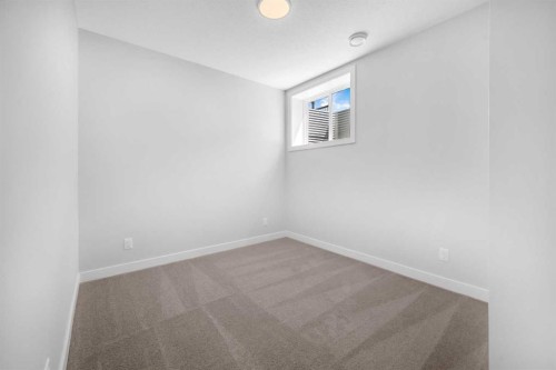 55 Amblehurst Link Nw, Calgary, AB - Indoor Photo Showing Other Room
