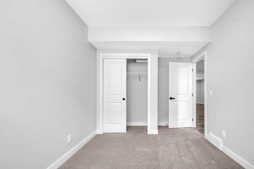 55 Amblehurst Link Nw, Calgary, AB - Indoor Photo Showing Other Room