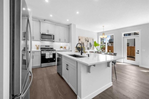 55 Amblehurst Link Nw, Calgary, AB - Indoor Photo Showing Kitchen With Double Sink With Upgraded Kitchen