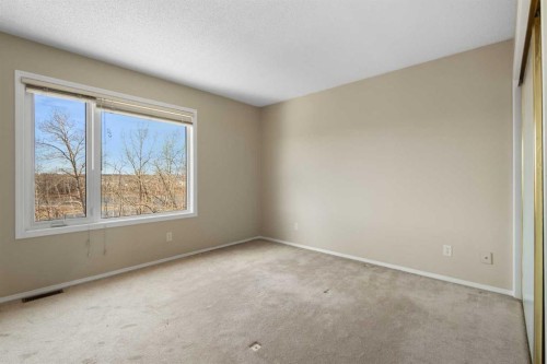 103 Riverside Way Se, Calgary, AB - Indoor Photo Showing Other Room