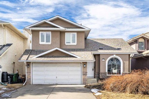 103 Riverside Way Se, Calgary, AB - Outdoor With Facade