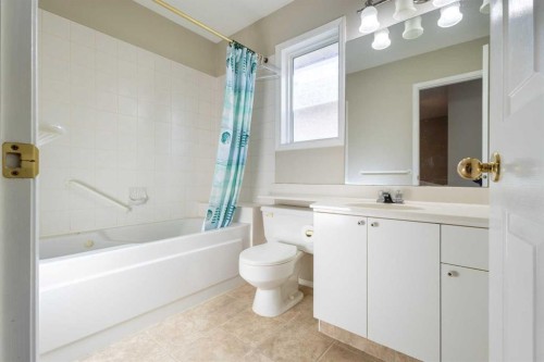 103 Riverside Way Se, Calgary, AB - Indoor Photo Showing Bathroom