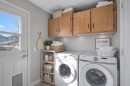 83 Luxstone Crescent Sw, Airdrie, AB  - Indoor Photo Showing Laundry Room 
