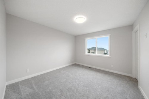37 Sora Gate Se, Calgary, AB - Indoor Photo Showing Other Room