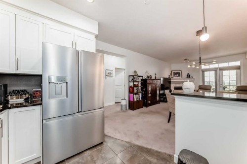 211-1005A Westmount Drive, Strathmore, AB - Indoor Photo Showing Kitchen