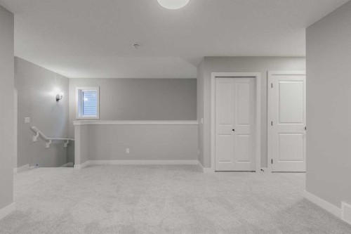 197 Bridgeport Gate, Chestermere, AB - Indoor Photo Showing Other Room