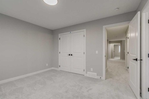 197 Bridgeport Gate, Chestermere, AB - Indoor Photo Showing Other Room