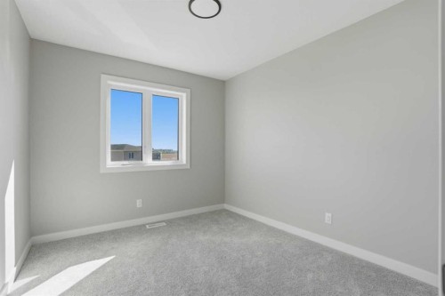 229 Bridgeport Gate, Chestermere, AB - Indoor Photo Showing Other Room